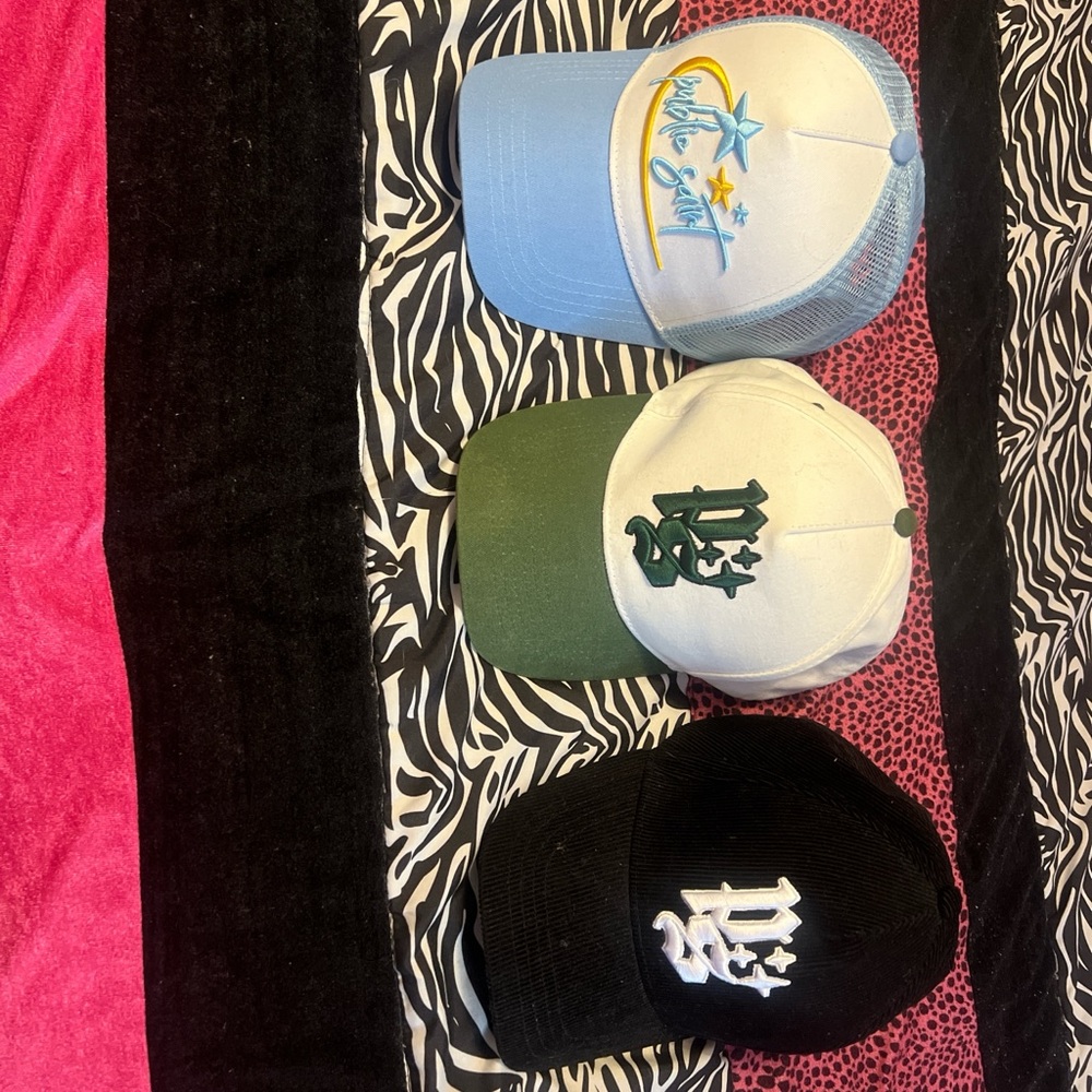 Public Saint trucker hats! 💙💛💚🖤